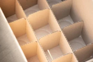 Using a wine glass box or cell boxes with a cardboard divider