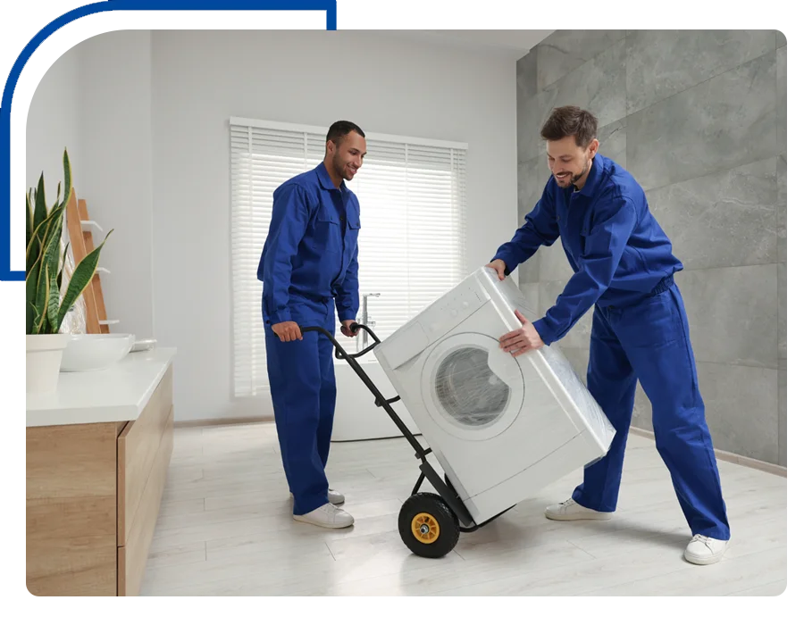 Two movers carrying washing machine during the move.